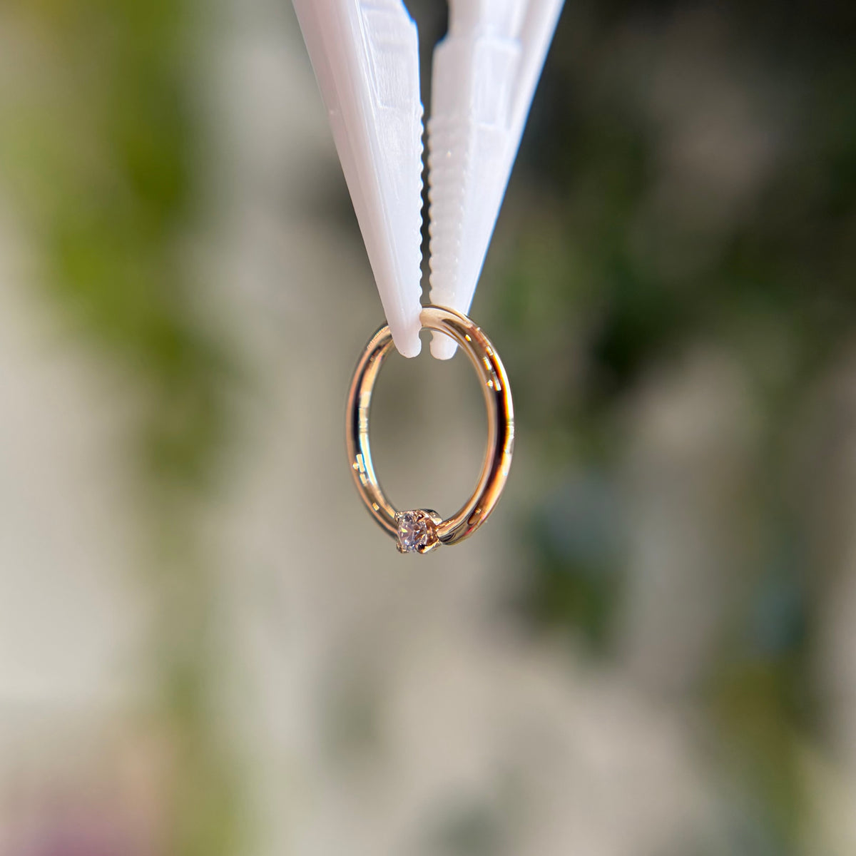 Fixed Ring with Prong Set Gem - Horizontal Orientation