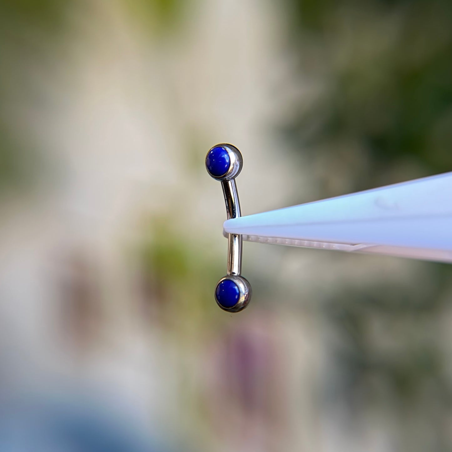 Titanium Cabochon Side Gem Curved Barbell - Lapis Blue