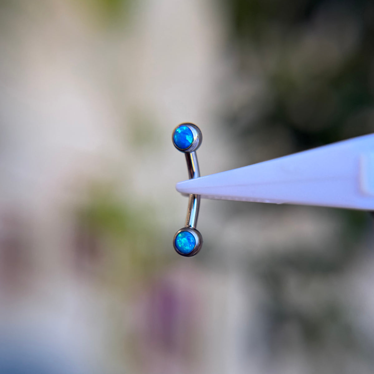 Titanium Cabochon Side Gem Curved Barbell - Capri Blue Opal