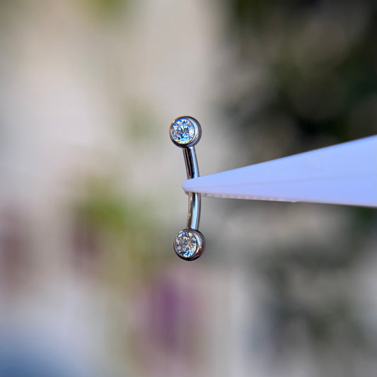Titanium Faceted Side Gem Curved Barbell - Cubic Zirconia