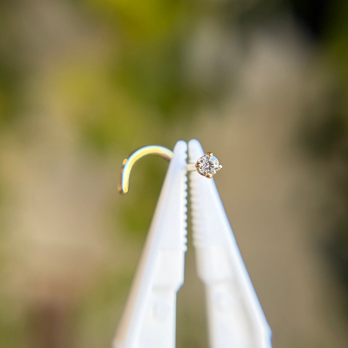 Corkscrew - 4 Prong Cubic Zirconia